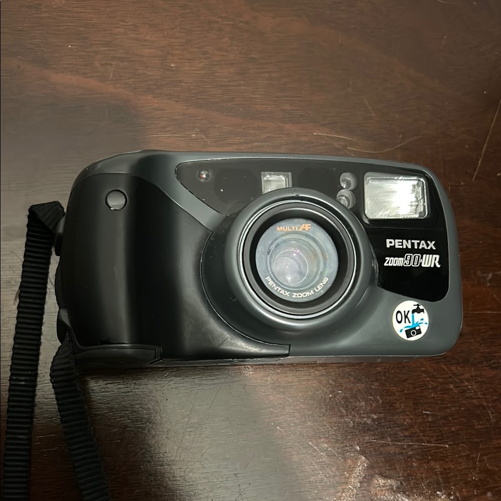 Pentax Black Film Camera with Autofocus and Built-in Flash
